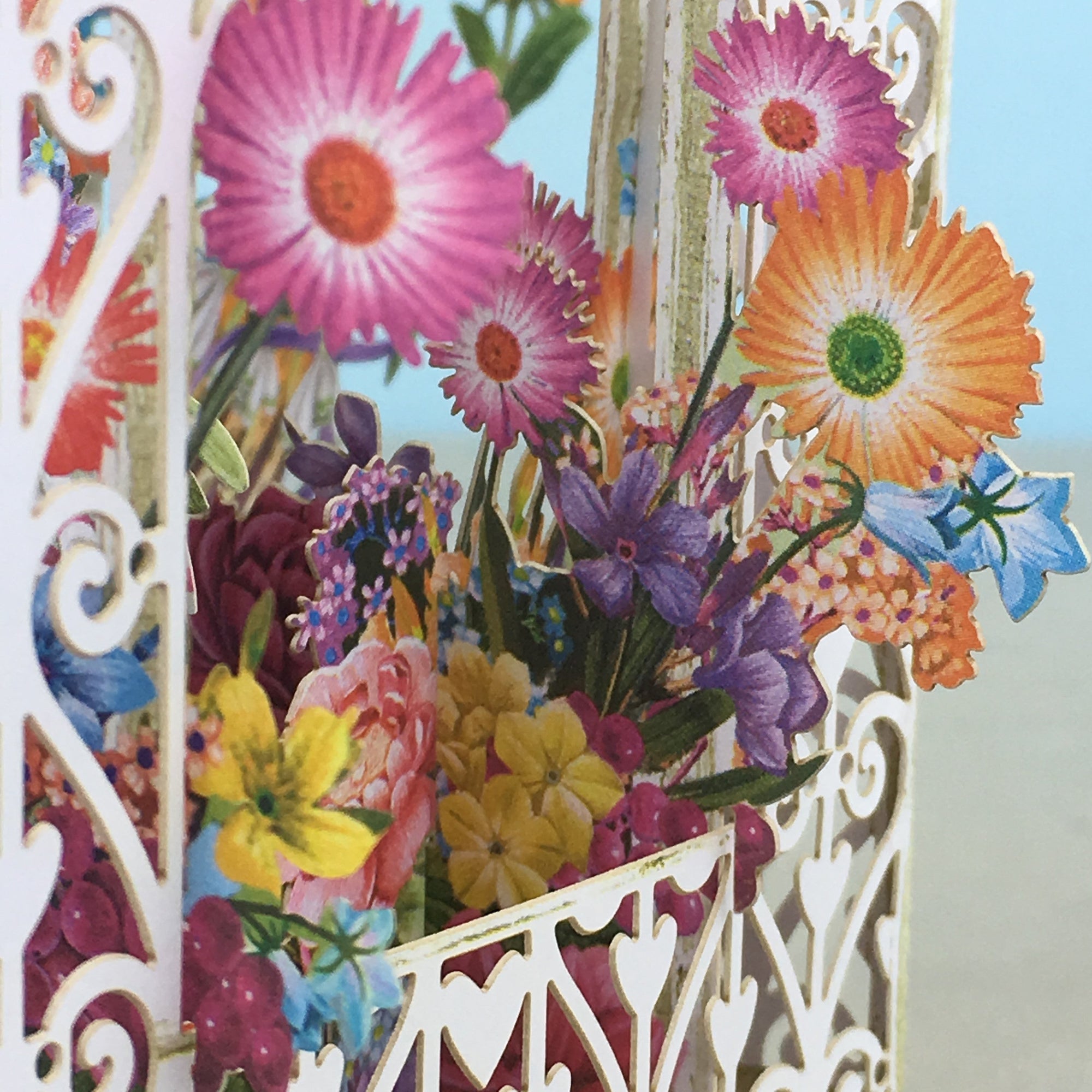 Flower Fairies play amongst flowers in laser cut paper birdcageby Me&McQ