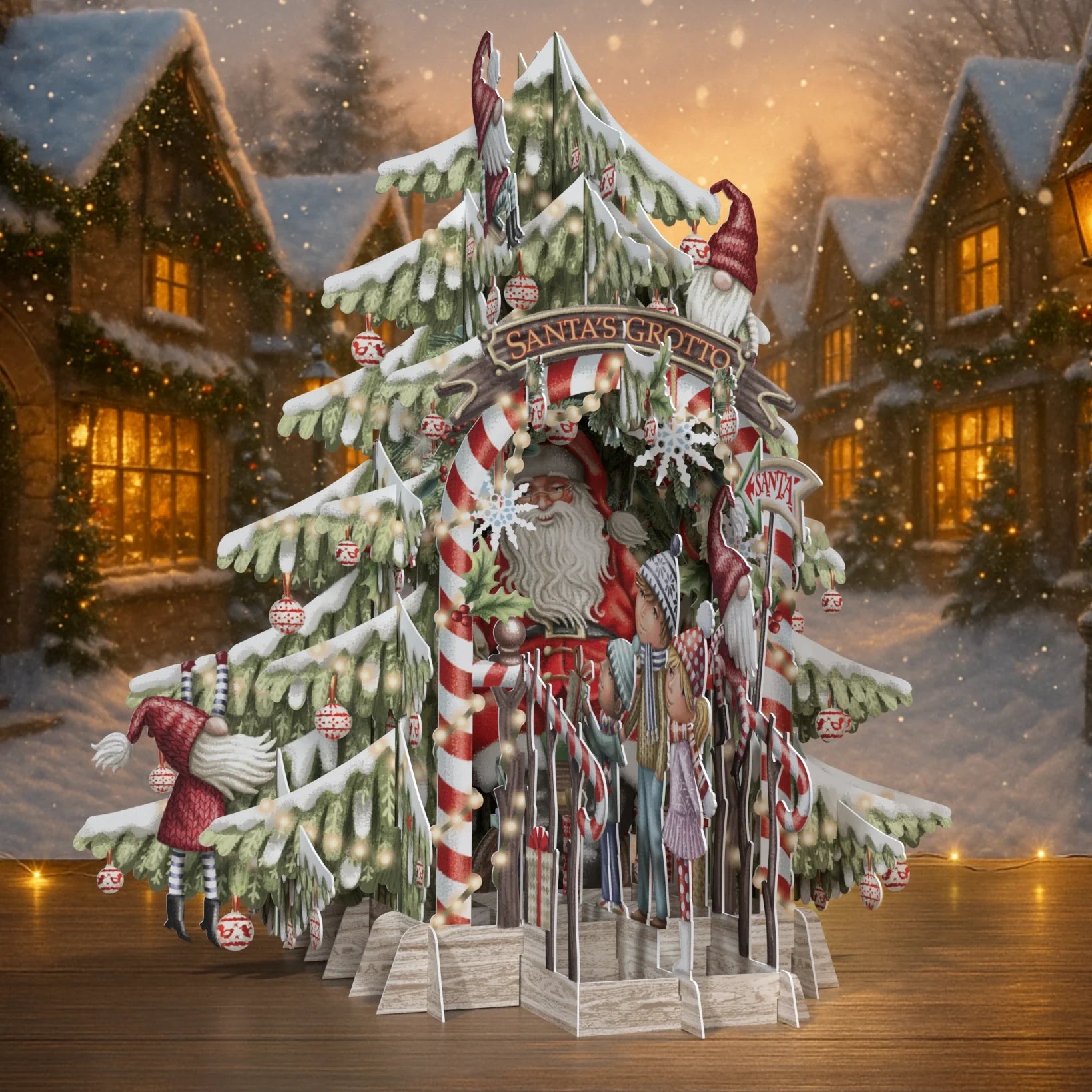Decorative Christmas Pop Up Card with Santa's Grotto and snow-covered village houses.